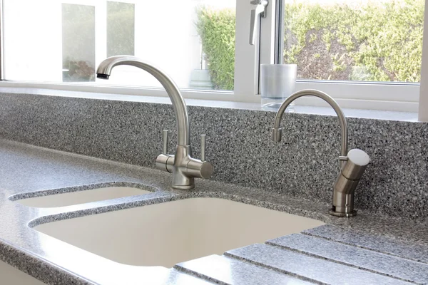 Kitchen mixer tap and sink — Stock Photo, Image