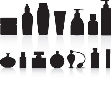 Selection of silhouettes of perfume or lotion bottles clipart