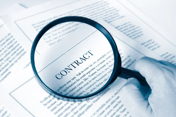 stock image Examining a contract