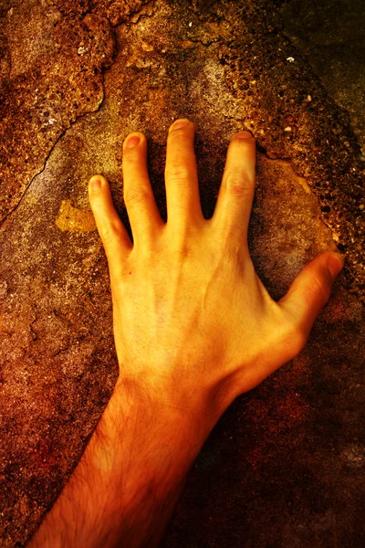 Hand on stone — Stock Photo, Image