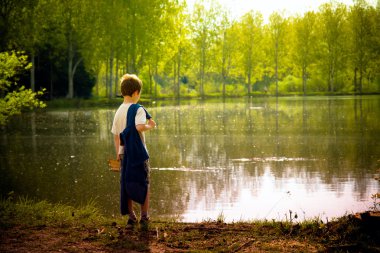 Young child in the nature clipart