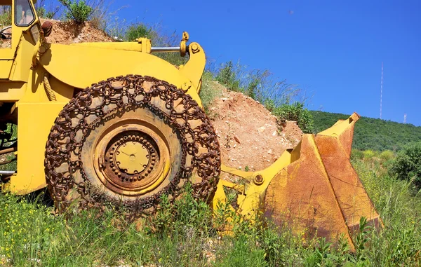 Oude gele bulldozer. — Stockfoto