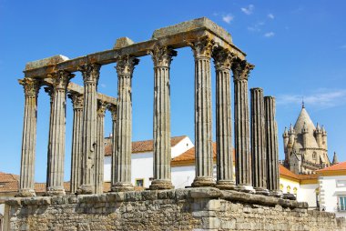 Roman temple and cathedral tower of Evora, Portugal. clipart