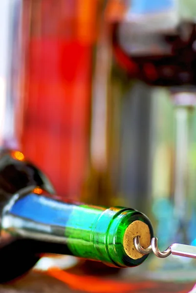 Wine Bottle closeup and corkscrew. — Stock Photo, Image