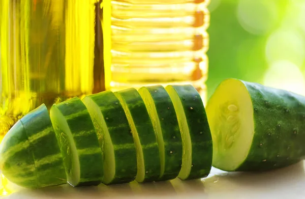 Cucumber slices, oliveoil and vinegar. — Stock Photo, Image