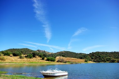 Boat in alqueva lake. clipart