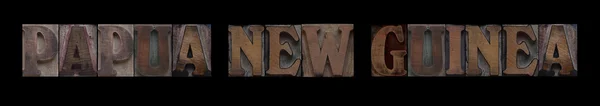 Papua New Guinea in old wood type — Stockfoto