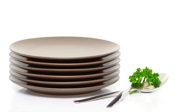 Placas, tenedor, cuchara y perejil — Stok fotoğraf