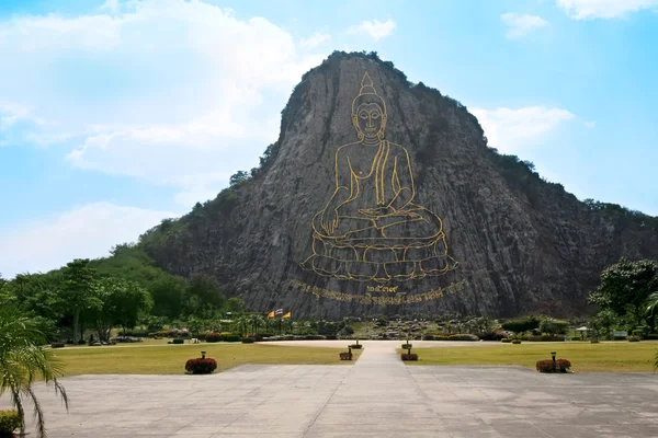 Gold contour of the Buddha on a mountain — Stock Photo, Image