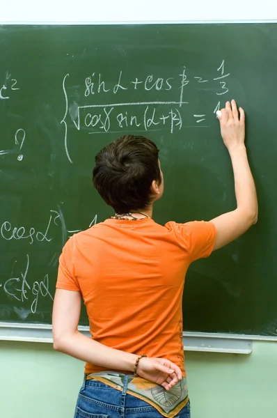 Iskoláslány. a matematika lecke — Stock Fotó