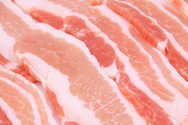 Raw bacon background — Stock Photo, Image