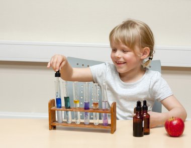 Child playing scientist clipart