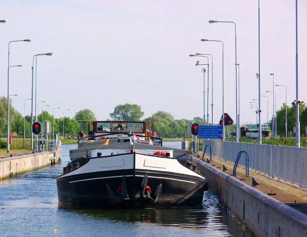 stock image River vessel in a lock