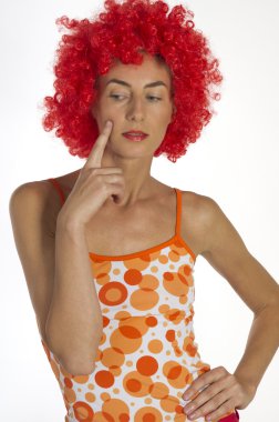 Beautiful woman in an orange wig