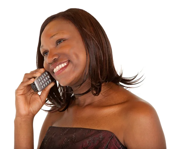 African american kobieta mówi do swojego telefonu — Zdjęcie stockowe