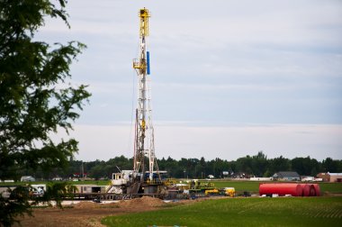 Oil rig drilling in Eastern Colorado, USA clipart