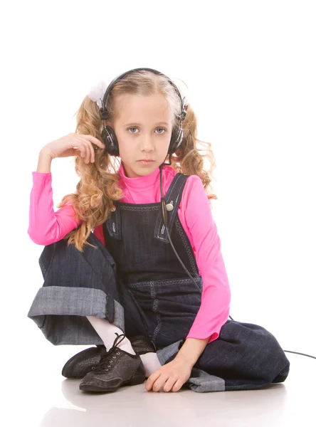 stock image Little girl listening music