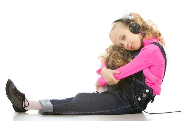 stock image Little girl listening music