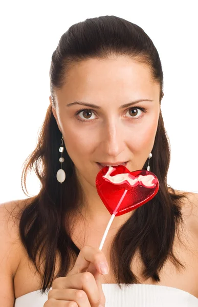 Portret kobiety ssanie jej cukierki — Zdjęcie stockowe