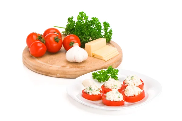Sliced tomato with cheese sauce — Stock Photo, Image