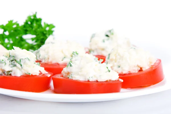 Sliced tomato with cheese sauce — Stock Photo, Image