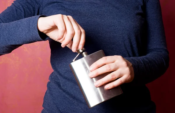 Flask in hands — Stock Photo, Image