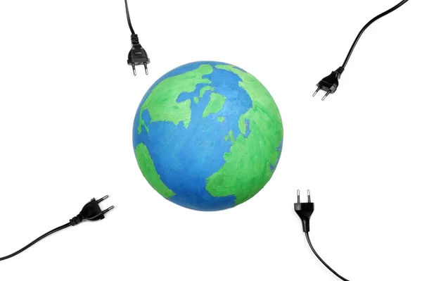 Electric plugs on earth — Stock Photo, Image