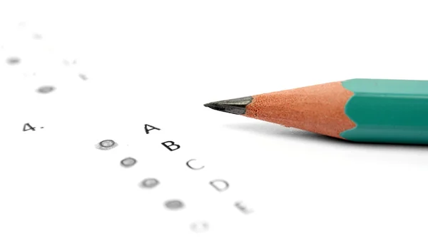 Pencil and test paper — Stock Photo, Image