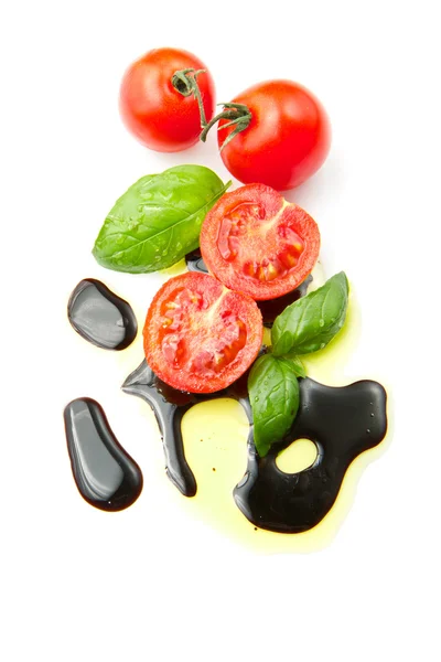 Čerstvé rajče s balsamikovým octem — Stock fotografie