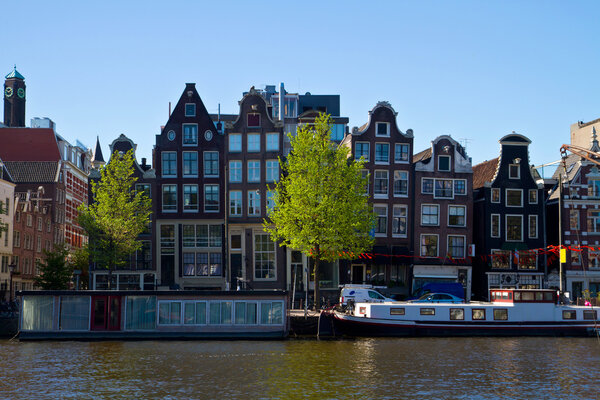 Beautiful houses on a canal in Amsterdam