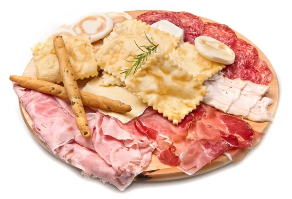 Tedavi et, peynir ve kızartılmış hamur tatlısı tabağı — Stok fotoğraf