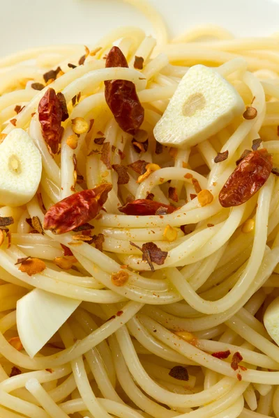 stock image Pasta garlic olive oil and red chili pepper