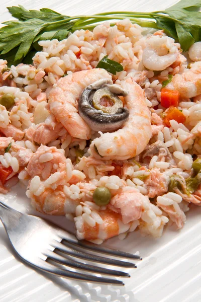 stock image Rice with salmon and prawns