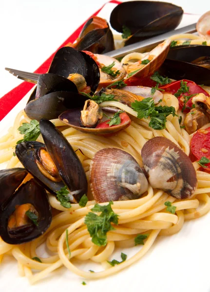 Вкусная паста с моллюсками — стоковое фото