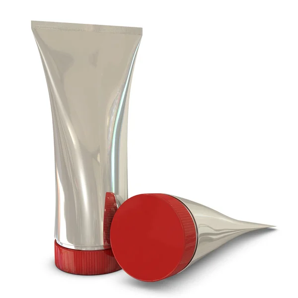 Embalagens de tubo de prata com tampas vermelhas — Fotografia de Stock