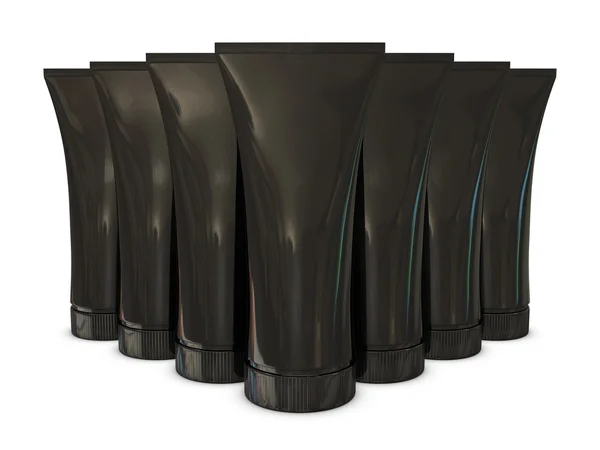 Grupo de paquetes de tubos negros con tapas negras — Foto de Stock