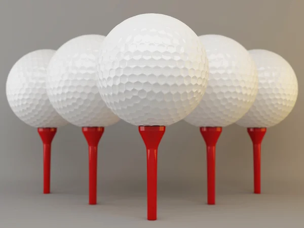 Gruppo di palline da golf su tee — Foto Stock