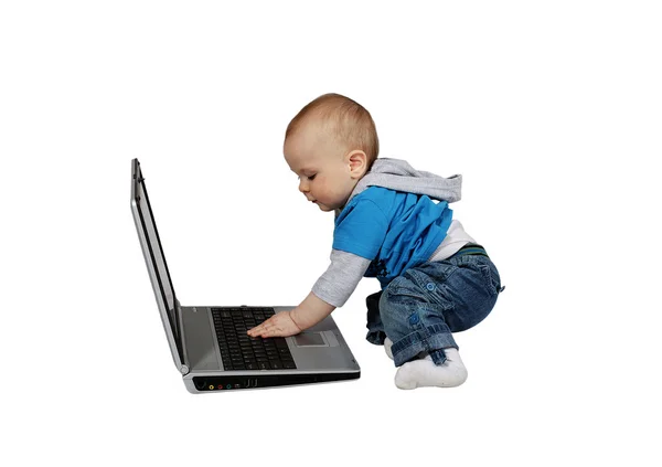 Niño con portátil — Foto de Stock