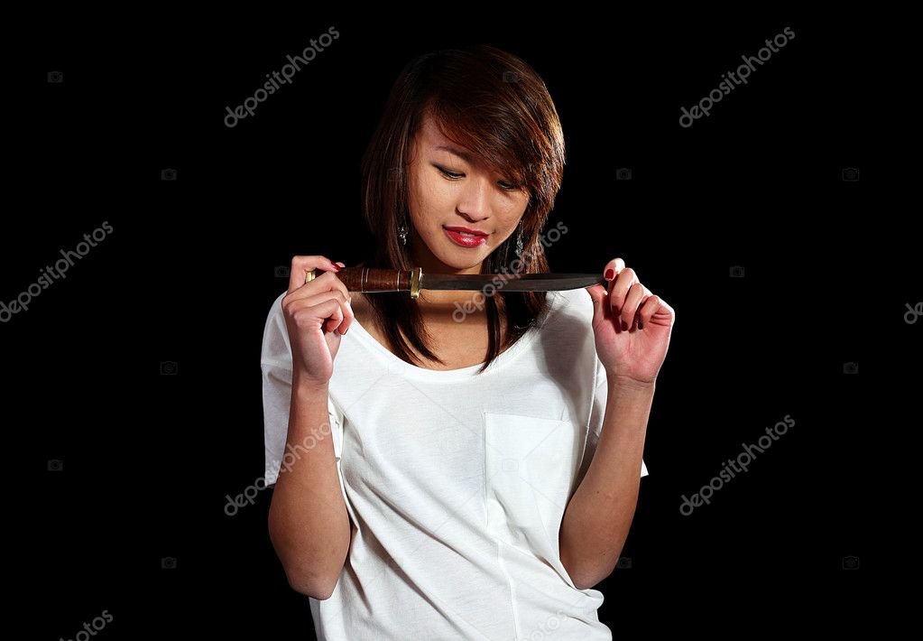 Girl with knife — Stock Photo © cmeder 5968992