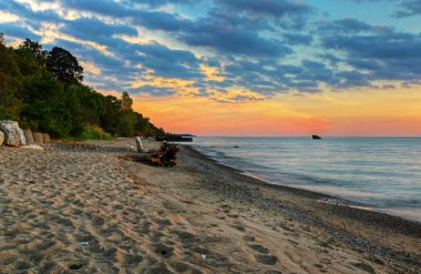 Beach at sunset clipart