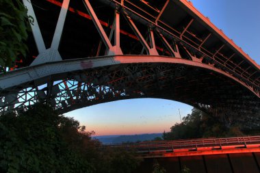 Dramatic angle of a bridge clipart