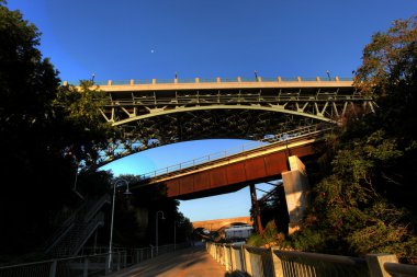 Dramatic angle of a bridge clipart