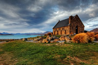 Church by a glacier lake clipart