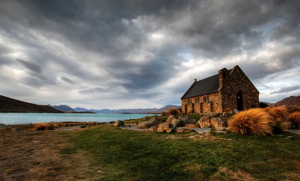 Church by a glacier lake — Stock Photo, Image
