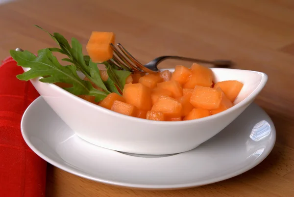 stock image Melon salad with arugula salad