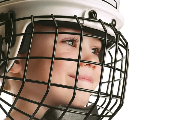 Хлопчик в хокейному шоломі Ліцензійні Стокові Зображення