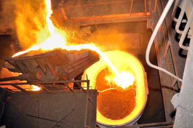 Pouring molten steel clipart