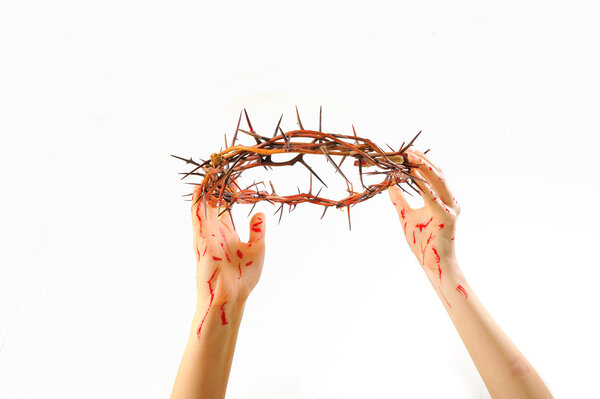 Crown of thorns and hands isolated