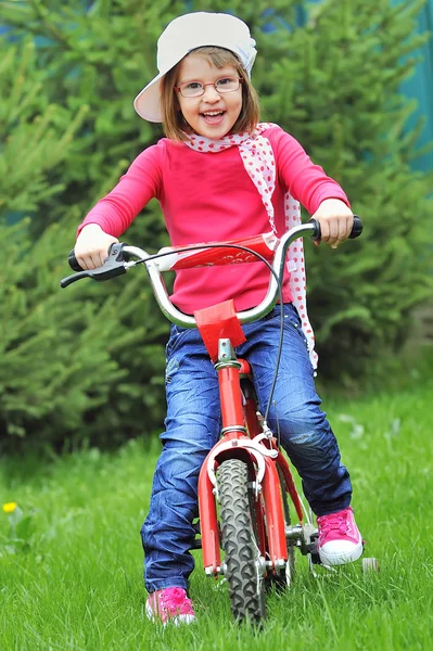Little girl with bike Stock Photo