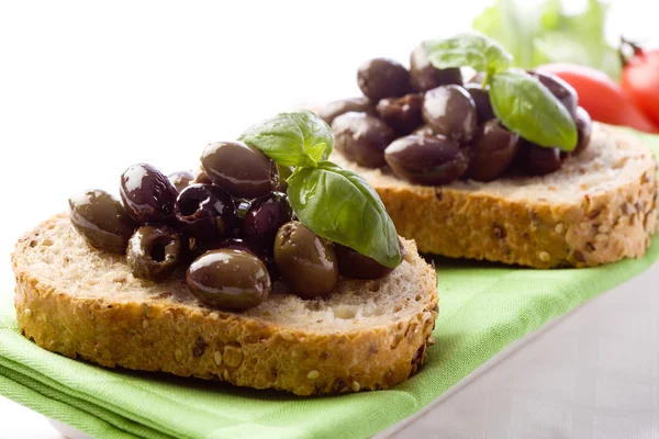 Bruschetta with olives — Stock Photo, Image